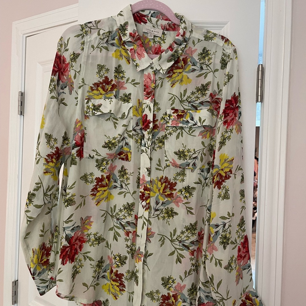 Woman’s large floral blouse
